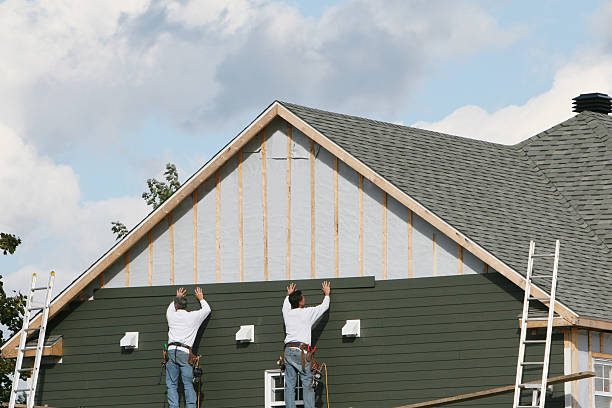 Professional Siding Installation technician working in Louisville, KY